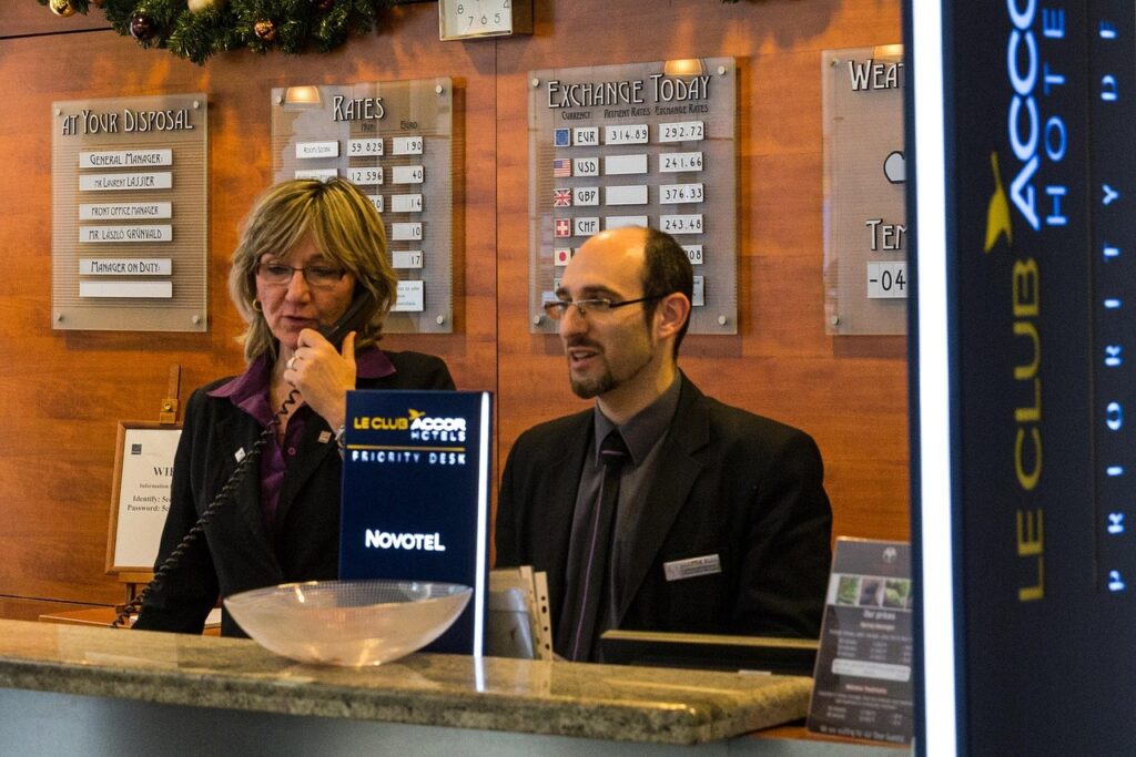 reception, hotel, desk, interior design, architecture, corporate, lobby, help, check in, people laugh, entrance hall, input range, key counter, registration, bell jar, leisure time, booking, to travel, business, service, call, tourism, women, men's suit, make a phone call, phone, check in, check in, check in, check in, check in